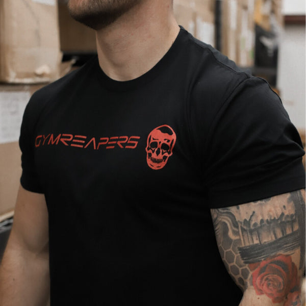 Basic Shirt in black with red logo being worn