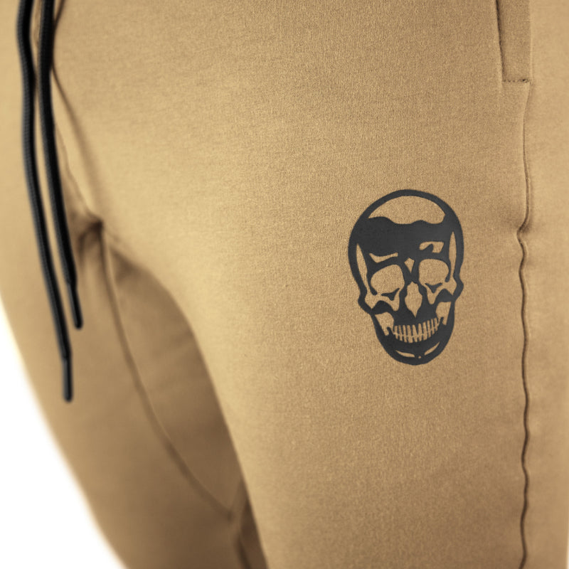 Gymreapers joggers in sand color with white logo