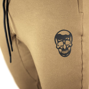 Gymreapers joggers in sand color with white logo